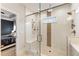 The main bathroom has a glass enclosed shower and a shower bench at 884 Mayfield Rd, Milton, GA 30009