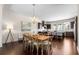 Inviting dining area showcases a modern chandelier and seamless flow into the kitchen at 2468 Skyland Ne Dr # 32, Atlanta, GA 30319