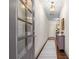 Inviting hallway with hardwood floors, modern lighting, and neutral decor at 2468 Skyland Ne Dr # 32, Atlanta, GA 30319