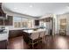 Bright and airy kitchen featuring dark wood cabinets and island seating, perfect for casual dining at 2468 Skyland Ne Dr # 32, Atlanta, GA 30319