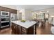 Open kitchen featuring a large island, stainless steel appliances, and seamless access to the dining area at 2468 Skyland Ne Dr # 32, Atlanta, GA 30319