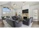 The clubhouse living room has vaulted ceilings, a fireplace, and multiple seating options at 2468 Skyland Ne Dr # 32, Atlanta, GA 30319