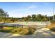 Community sand volleyball court with nets, adjacent to paved walking path at 2468 Skyland Ne Dr # 32, Atlanta, GA 30319