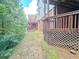 Spacious backyard area with multiple levels of decks and lush greenery for outdoor enjoyment at 2921 Royston Dr, Duluth, GA 30097