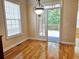 Bright breakfast nook with hardwood floors, large windows, and an access door to the deck at 2921 Royston Dr, Duluth, GA 30097