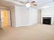Spacious living room with neutral carpet, fireplace and lots of space for living at 2921 Royston Dr, Duluth, GA 30097