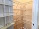 Walk-in pantry with ample shelving, providing organized storage space at 2921 Royston Dr, Duluth, GA 30097