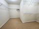 Spacious walk-in closet featuring wire shelving for organized storage at 2921 Royston Dr, Duluth, GA 30097