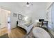Bright bedroom featuring natural light, high ceilings, and hardwood floors at 3680 Sewell Mill Rd, Marietta, GA 30062
