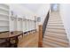 Spacious entryway with custom storage lockers and staircase at 3680 Sewell Mill Rd, Marietta, GA 30062
