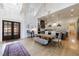 Inviting foyer featuring high ceilings, a dining table, and an open view of the gourmet kitchen at 3680 Sewell Mill Rd, Marietta, GA 30062