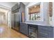 Kitchen area with built-in wine cooler and beverage center at 3680 Sewell Mill Rd, Marietta, GA 30062