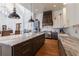 Well-lit kitchen with a spacious island, stainless steel appliances, granite countertops, and plenty of cabinet space at 3680 Sewell Mill Rd, Marietta, GA 30062