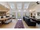 Sun-filled living room featuring high ceilings, hardwood floors and an open layout at 3680 Sewell Mill Rd, Marietta, GA 30062