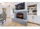 Modern living room featuring a sleek fireplace with built-in shelving at 3680 Sewell Mill Rd, Marietta, GA 30062