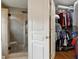 A view into the walk-in closet from the bathroom, which includes a shower at 518 Hill St Se, Atlanta, GA 30312
