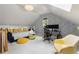 Finished bedroom with a playful design, blue daybed, and a functional study space at 518 Hill St Se, Atlanta, GA 30312