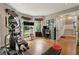 Spacious exercise room and office with hardwood floors and natural light, near doorway and stairs at 518 Hill St Se, Atlanta, GA 30312