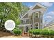Attractive two-story home with new paint, landscaped front yard, and a welcoming porch at 518 Hill St Se, Atlanta, GA 30312