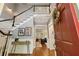 Inviting home foyer featuring hardwood floors, an elegant staircase, and access to the living spaces at 518 Hill St Se, Atlanta, GA 30312