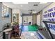 Finished basement featuring exercise equipment, weights, and bright lighting with walkout access at 1768 Hood Rd, Dacula, GA 30019