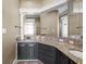 Bathroom vanity with dual sinks, granite countertops, and ample storage at 1768 Hood Rd, Dacula, GA 30019