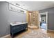 Modern bathroom featuring double vanity with marble countertop and a glass-enclosed shower with decorative tile at 1768 Hood Rd, Dacula, GA 30019