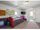 Comfortable bedroom with carpet, tv, and a unique color scheme at 1768 Hood Rd, Dacula, GA 30019
