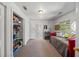 Cozy bedroom with carpeting, closet space, and access to an adjacent room at 1768 Hood Rd, Dacula, GA 30019