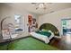 Stylish bedroom featuring an egg chair, and hardwood floors at 1768 Hood Rd, Dacula, GA 30019