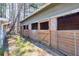 Rustic horse barn featuring multiple stalls with wood and brick, offering country charm at 1768 Hood Rd, Dacula, GA 30019