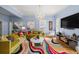 Stylish living room with hardwood floors, a colorful rug, and a contemporary aesthetic at 1768 Hood Rd, Dacula, GA 30019