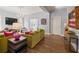 Bright living room with comfortable seating, stylish decor, and hardwood floors at 1768 Hood Rd, Dacula, GA 30019