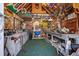 Inside the shed, tools, signage, and golf gear are displayed and stored for functional space at 1768 Hood Rd, Dacula, GA 30019