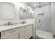 Elegant bathroom boasts a marble vanity, dual sinks, and a glass-enclosed shower at 1863 Bruce Ne Rd, Atlanta, GA 30329