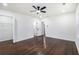 Open bedroom with hardwood floors, walk-in closet and bright white walls at 1863 Bruce Ne Rd, Atlanta, GA 30329