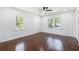 Spacious bedroom featuring hardwood floors, natural light, and neutral walls at 1863 Bruce Ne Rd, Atlanta, GA 30329