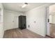 Functional laundry room with a refrigerator, brick wall, and ample space for storage at 1863 Bruce Ne Rd, Atlanta, GA 30329