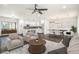Bright living room with hardwood floors, open floor plan, and view of the dining area at 1863 Bruce Ne Rd, Atlanta, GA 30329