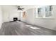 Inviting living room featuring a fireplace, natural light, and modern flooring at 1863 Bruce Ne Rd, Atlanta, GA 30329
