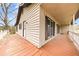 A wide, covered porch offers ample outdoor living space and charm at 2285 Bascomb Carmel Rd, Woodstock, GA 30189