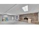 Large unfinished basement with fireplace, access to backyard and refrigerator at 2285 Bascomb Carmel Rd, Woodstock, GA 30189