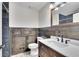 Charming bathroom with wood paneling, modern sink and a stylish mirror at 2285 Bascomb Carmel Rd, Woodstock, GA 30189