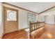 Inviting entryway with hardwood floors and decorative front door at 2285 Bascomb Carmel Rd, Woodstock, GA 30189