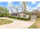 Well maintained ranch style home with detached garage and landscaping at 2285 Bascomb Carmel Rd, Woodstock, GA 30189