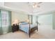 Spacious main bedroom boasts trey ceilings, plush carpet, and an abundance of natural light at 3272 Creek E Trce, Powder Springs, GA 30127