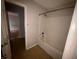A bathroom with a tub and shower combination at 5761 Harrier Ln, Atlanta, GA 30349