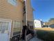 Exterior of house with damage, chimney, window, door, and siding at 5761 Harrier Ln, Atlanta, GA 30349
