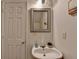 Bathroom featuring a modern mirror over a sink, and neutral wall color at 5835 Terremont Cir, Norcross, GA 30093