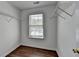 Organized closet with shelving and a window at 5835 Terremont Cir, Norcross, GA 30093